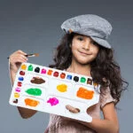 Little girl drawing in classroom at Rudra The Practical School CBSE school in Nashik